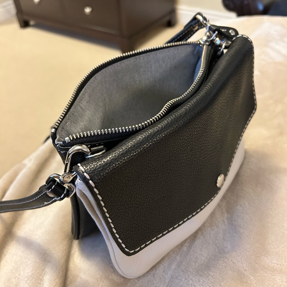 ROOTS Crossbody. Top Zip and Front flap, Adjustable strap Black and Off-white - Picture 2 of 7
